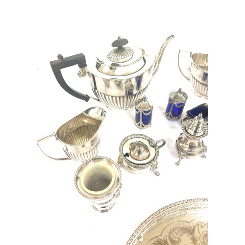 129 - Selection of silver plated items includes pepper pots etc
