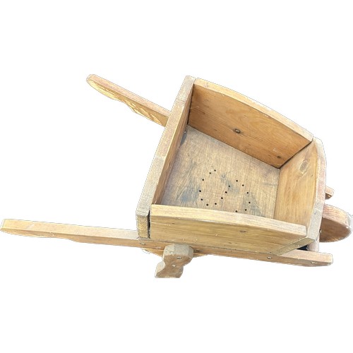122 - Small Wooden wheel barrow, 28 inches long 13 inches tall