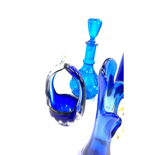 202 - Selection of Blue glassware includes Vases, duck, decanters etc tallest vase measures 21 inches tall