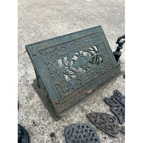 101D - Metal Lectern, 4 door stops ( includes pair marked Kenrick) and 3 trivets