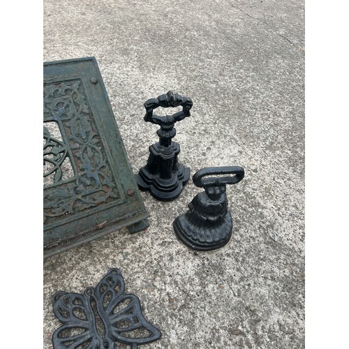 101D - Metal Lectern, 4 door stops ( includes pair marked Kenrick) and 3 trivets