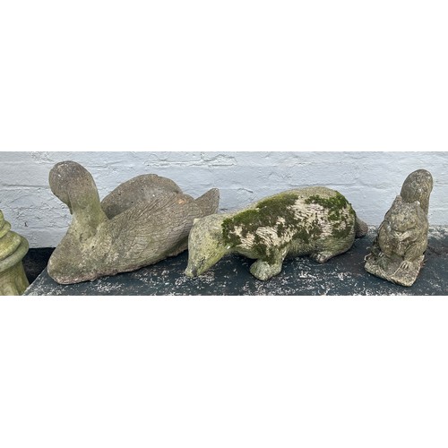 101B - 3 Concrete garden animals, Swan, Squirrel and badger, largest is 12.5 inches tall