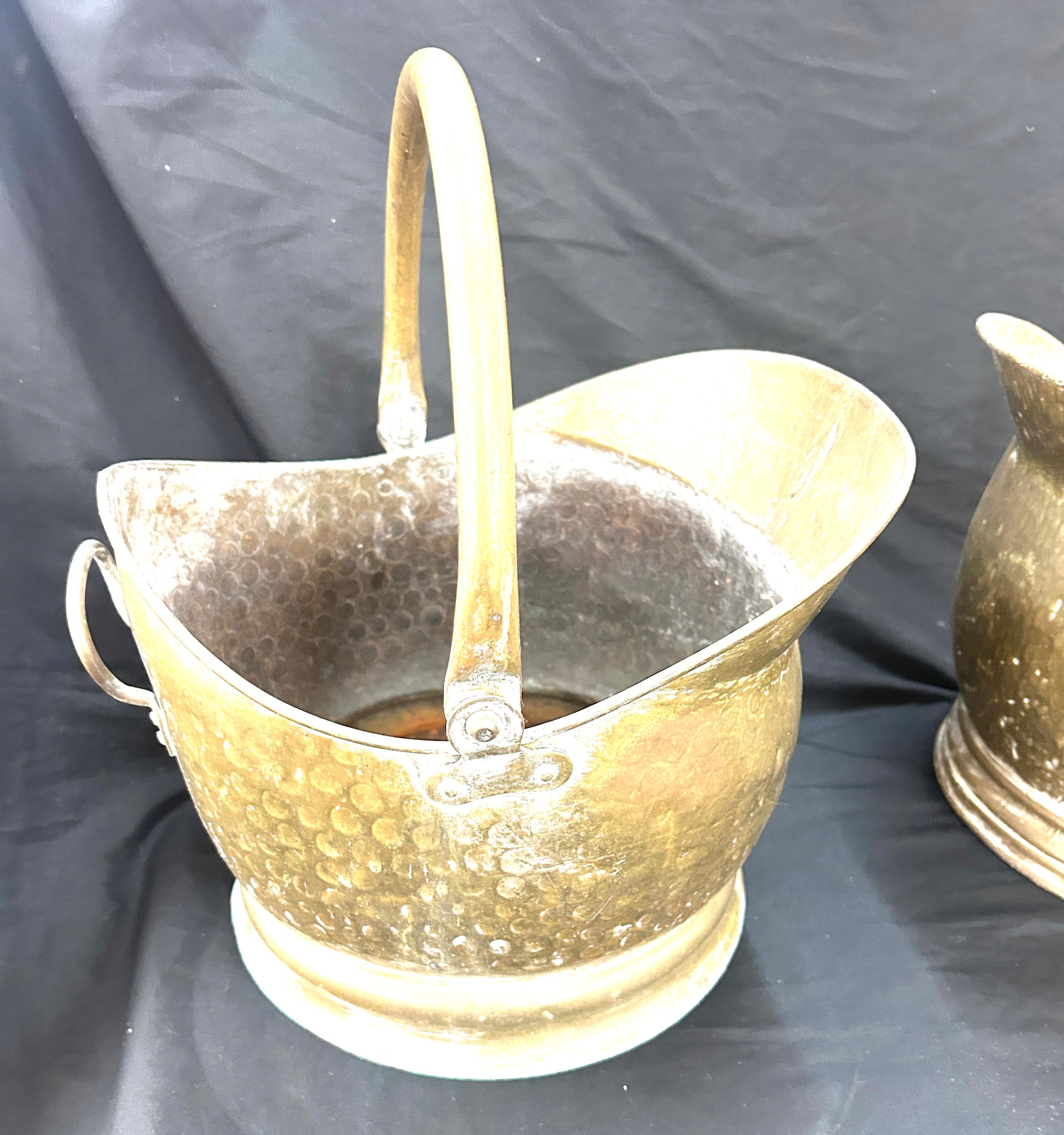 Two brass helmet coal scuttles
