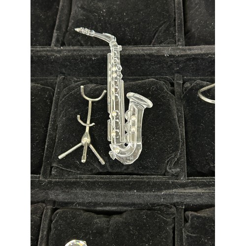 Selection boxed Swarovski crystal musical instrument ornaments to