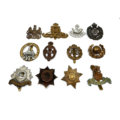 303 - 12 military cap badges