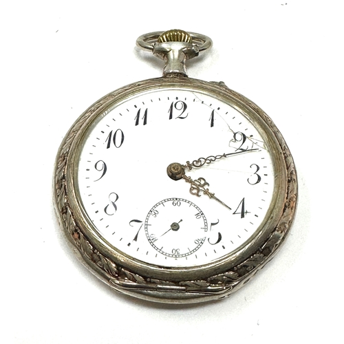 334 - Antique silver open face pocket watch the watch is ticking