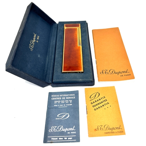 356 - Boxed Rare S.T. Dupont Table Lighter with Gold Trim. complete with booklets etc in great condition