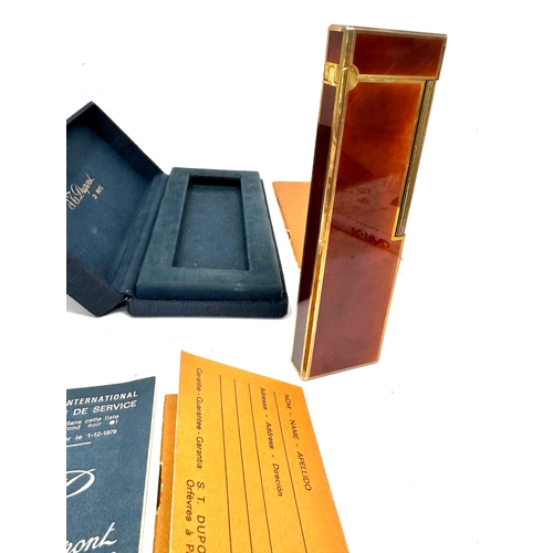 356 - Boxed Rare S.T. Dupont Table Lighter with Gold Trim. complete with booklets etc in great condition