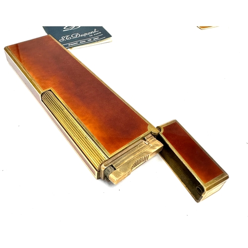 356 - Boxed Rare S.T. Dupont Table Lighter with Gold Trim. complete with booklets etc in great condition