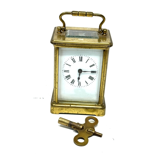 357 - French brass carriage clock with key in working order
