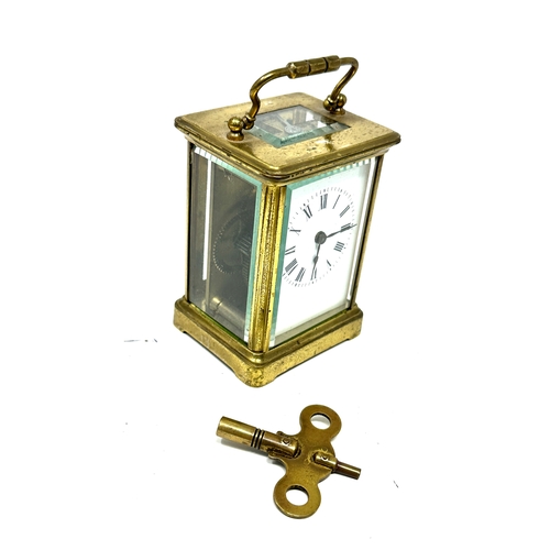 357 - French brass carriage clock with key in working order