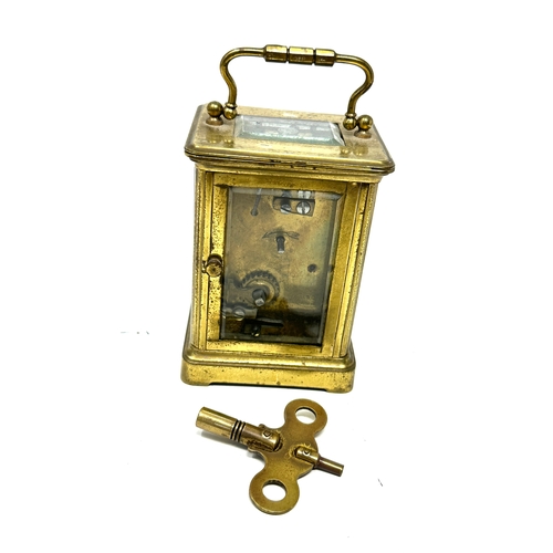 357 - French brass carriage clock with key in working order
