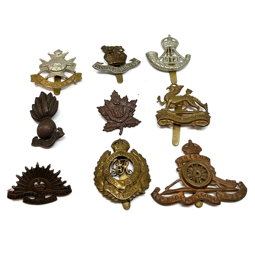 326 - 9 military cap badges