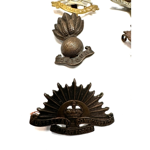 326 - 9 military cap badges