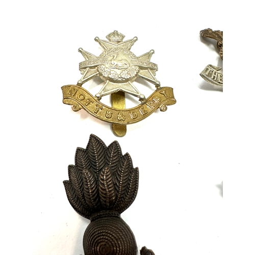 326 - 9 military cap badges