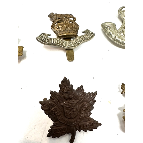 326 - 9 military cap badges