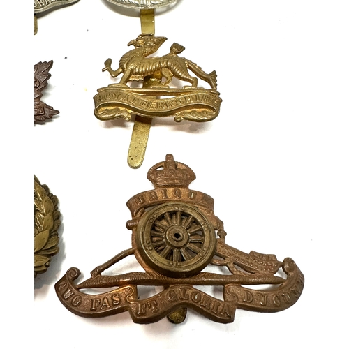 326 - 9 military cap badges