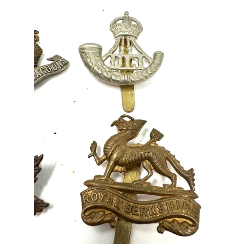 326 - 9 military cap badges