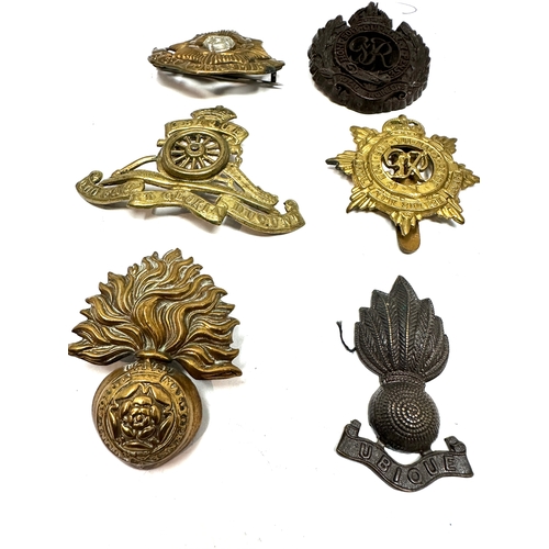 327 - 9 military cap badges