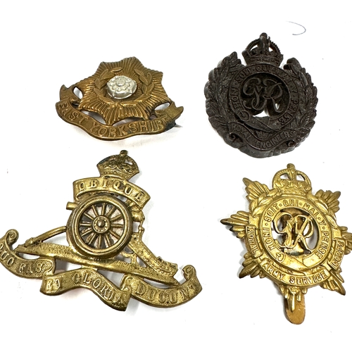327 - 9 military cap badges
