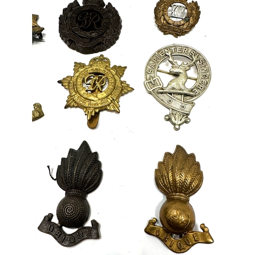 327 - 9 military cap badges