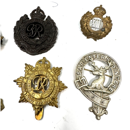 327 - 9 military cap badges