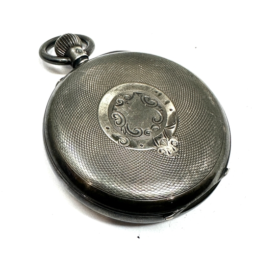 311 - Antique silver open face pocket watch  the watch is  ticking