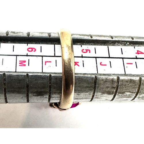 274 - 14 ct gold red gemstone set ring weight 3.4g