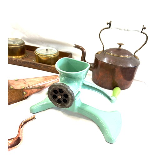 141 - Selection of metalware to include brass and copper ware to include kettles, barometer, enamel mincer... 