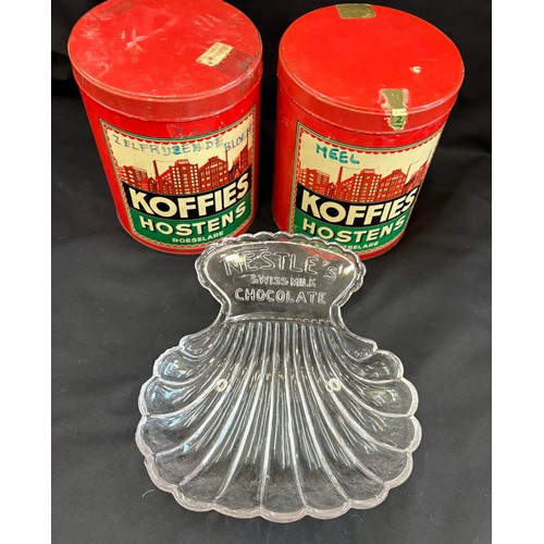 62 - Three vintage advertising pieces to Koffies Hostens lidded tins and a Nestle dish