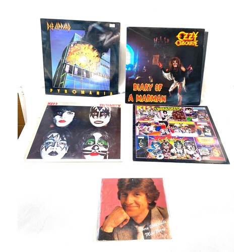 89 - Selection of four vinyl LPs to include Ozzy Osbourne, Kiss and Dek Leppard