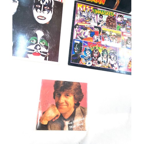 89 - Selection of four vinyl LPs to include Ozzy Osbourne, Kiss and Dek Leppard