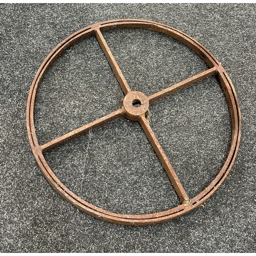 100E - Vintage cast iron wheel measures approximately 23 inches diameter