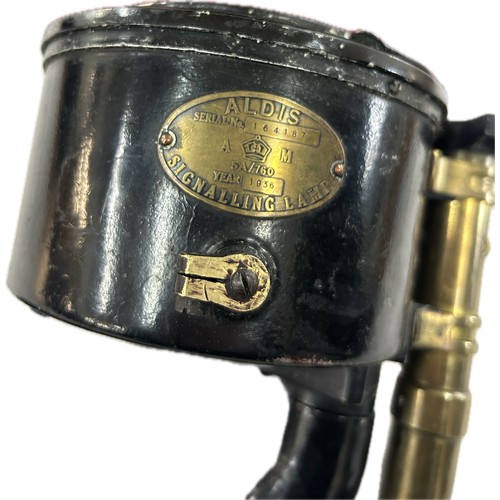 107 - Early 20th century Aldis hand signalling lamp with original transport case