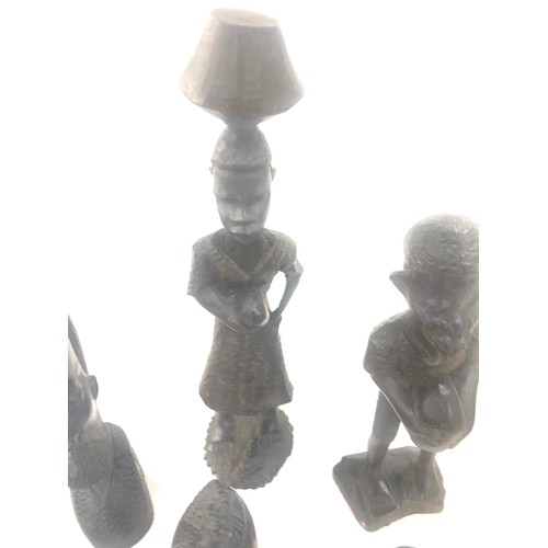 76 - Selection of carved wooden african figures
