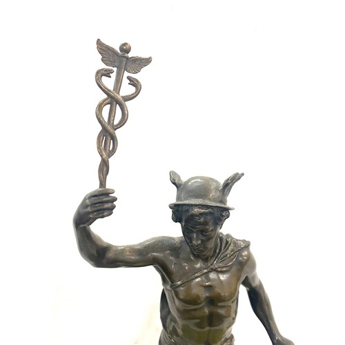 99A - Antique bronze sculpture of Hermes, messenger of the gods. Marble base. Height 39cm.