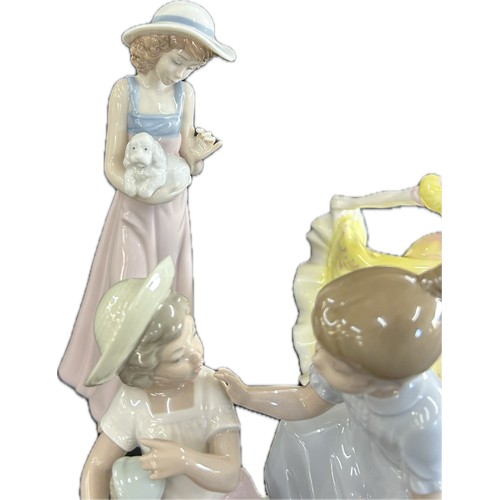 102 - Three vintage porcelain figurines one Royal Doulton, two Nao, tallest measures approximately: 10 inc... 