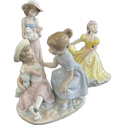 102 - Three vintage porcelain figurines one Royal Doulton, two Nao, tallest measures approximately: 10 inc... 