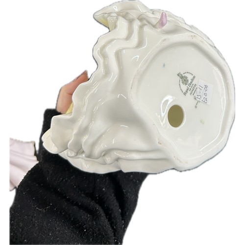 102 - Three vintage porcelain figurines one Royal Doulton, two Nao, tallest measures approximately: 10 inc... 