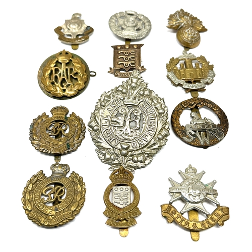 400 - 12 military cap badges