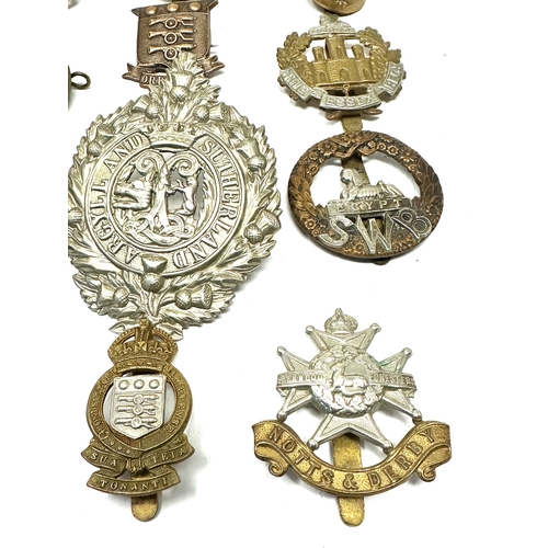 400 - 12 military cap badges