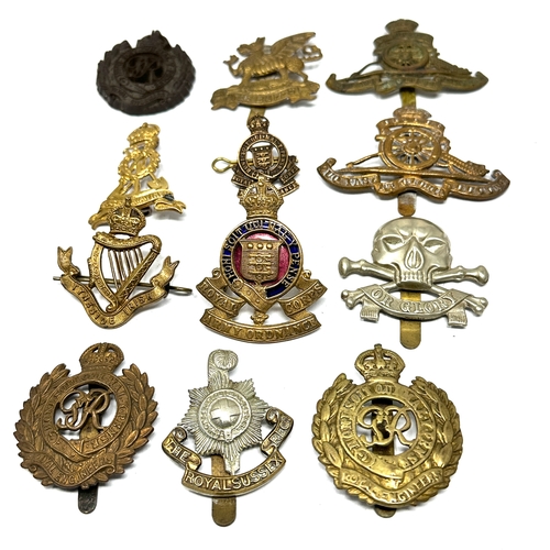 401 - 12 military cap badges