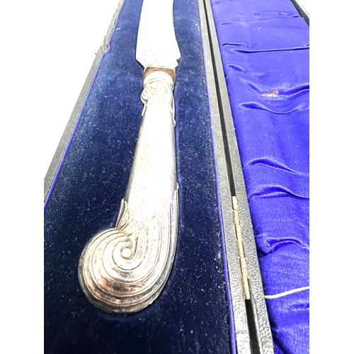 61 - Boxed large pistol grip silver handle carving knife by boodle & dunthorne