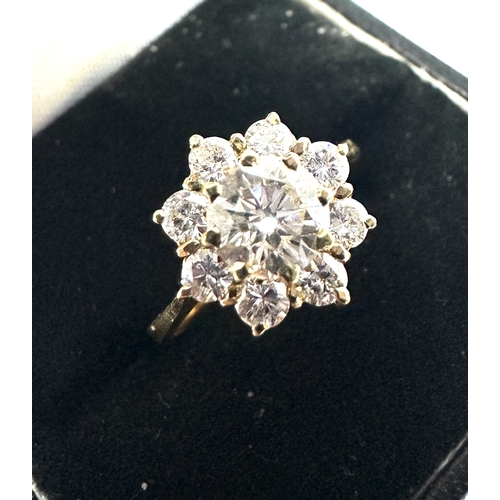 245 - 18ct gold diamond ring centre diamond measures approx 6mm with a halo og 2mm diamonds est 1ct diamon... 