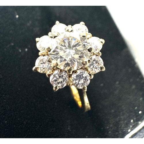 245 - 18ct gold diamond ring centre diamond measures approx 6mm with a halo og 2mm diamonds est 1ct diamon... 