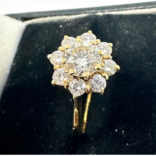 245 - 18ct gold diamond ring centre diamond measures approx 6mm with a halo og 2mm diamonds est 1ct diamon... 