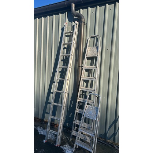 100L - Two sets of aluminium ladders one extending and a set of step ladders