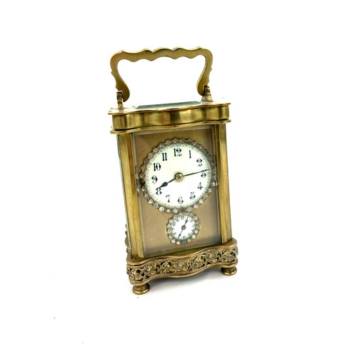 499 - Antique brass carriage clock possibly French, strikes with bell