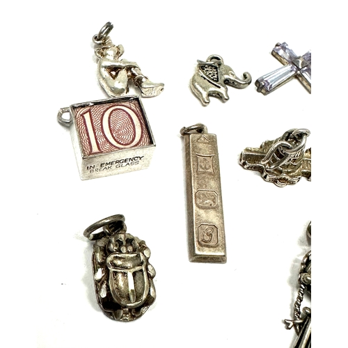 160 - 12 vintage silver charms weight 31g