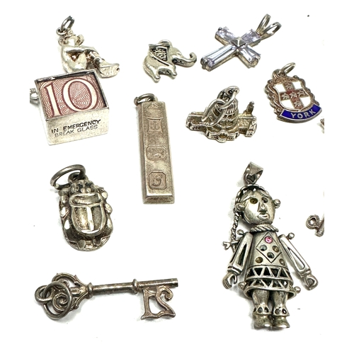 160 - 12 vintage silver charms weight 31g